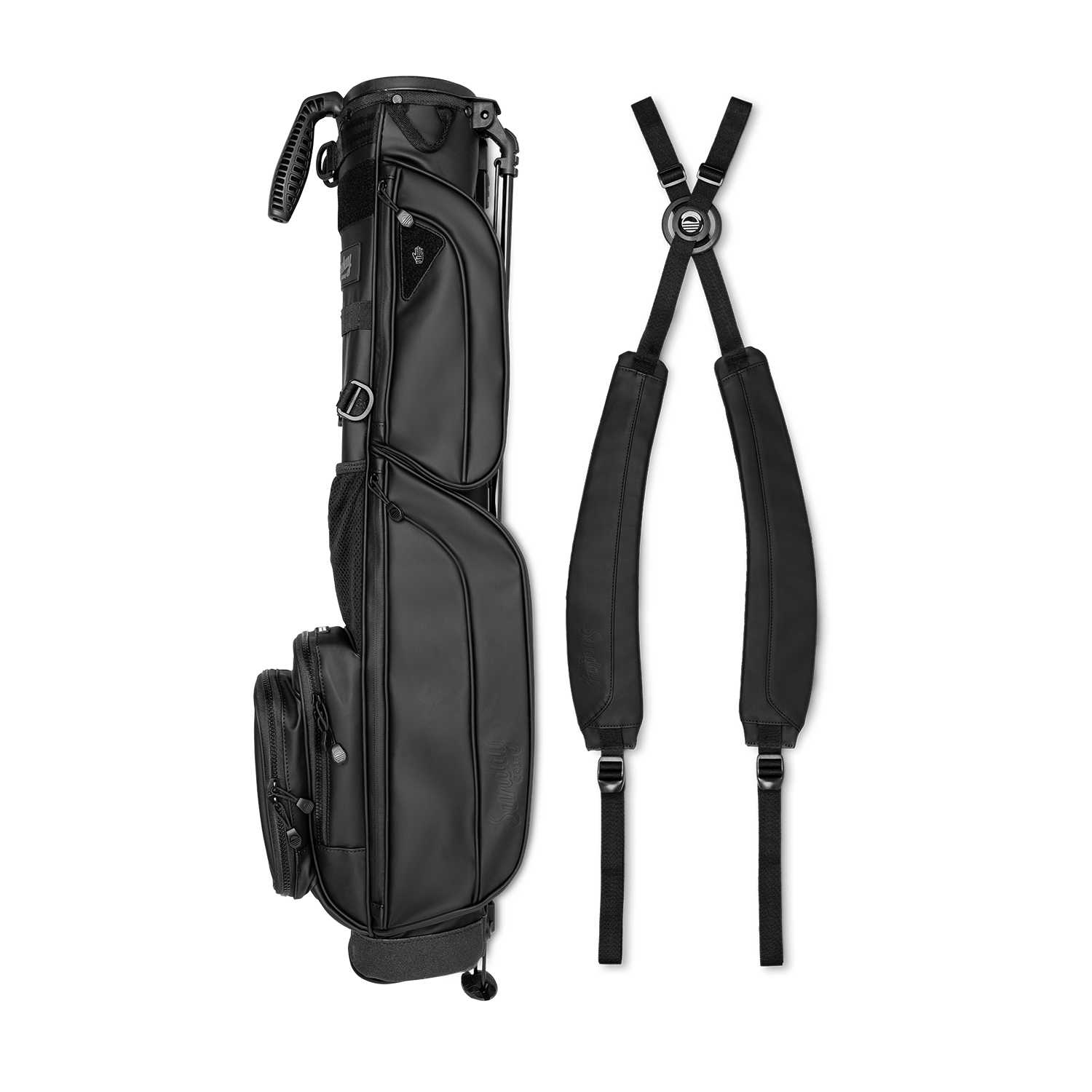 A full shot of Loma XL S-Class golf bag in black vegan leather laying flat sideways beside its double strap