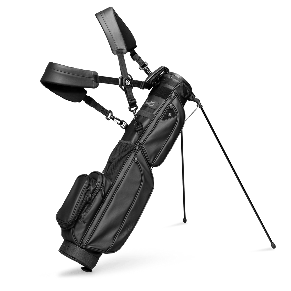A full front shot of standing Loma S-Class golf bag in black vegan leather with double strap