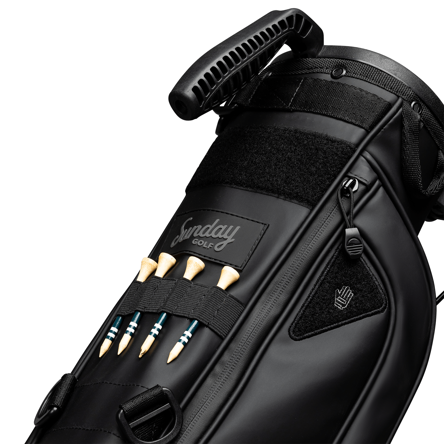 A close up of Loma XL S-Class golf bag in black vegan leather showing the front with bamboo golf tees
