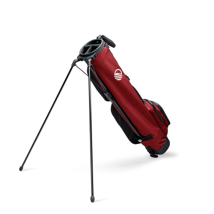 A full shot of standing Loma XL golf bag in deep red burgundy facing backward