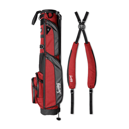 A full shot of Loma XL golf bag in deep red burgundy laying flat sideways beside its double strap