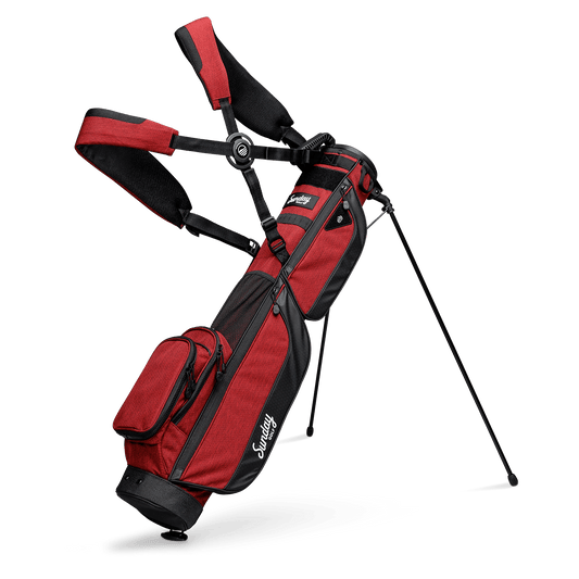 A full front shot of standing Loma XL golf bag in deep red burgundy with double strap