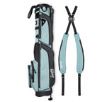 A full shot of Loma XL golf bag in seafoam green laying flat sideways beside its double strap