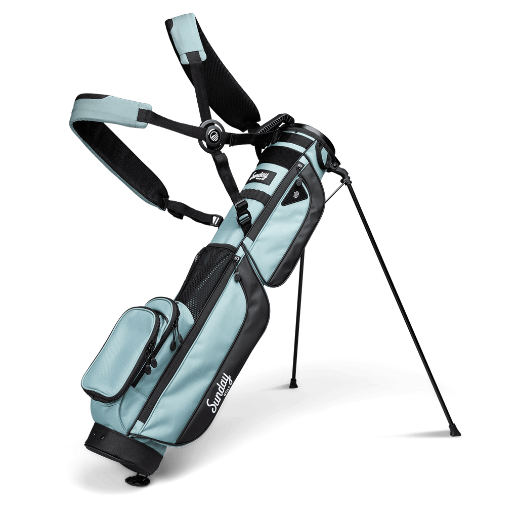 A full front shot of standing Loma XL golf bag in seafoam green with double strap