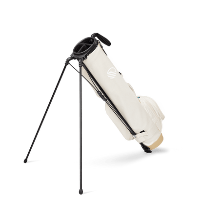 A full shot of standing Loma XL golf bag in toasted almond facing backward