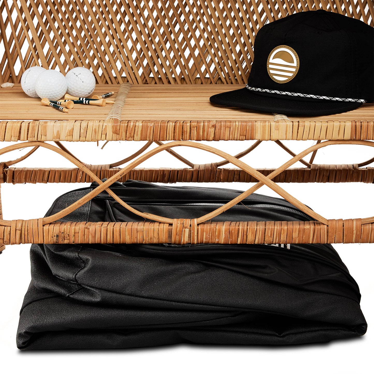The mule travel golf bag folded under a chair
