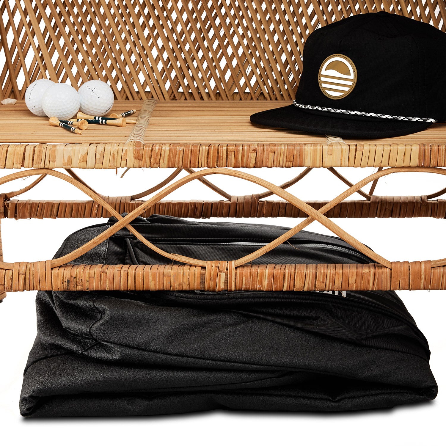 The mule travel golf bag folded under a chair