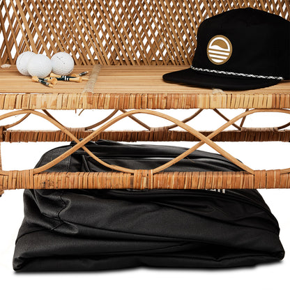 The mule travel golf bag folded under a chair