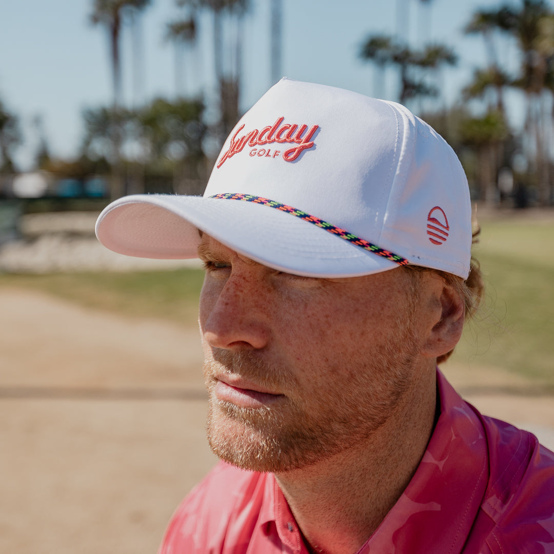 A man wearing tropical rope golf hat by Sunday Golf