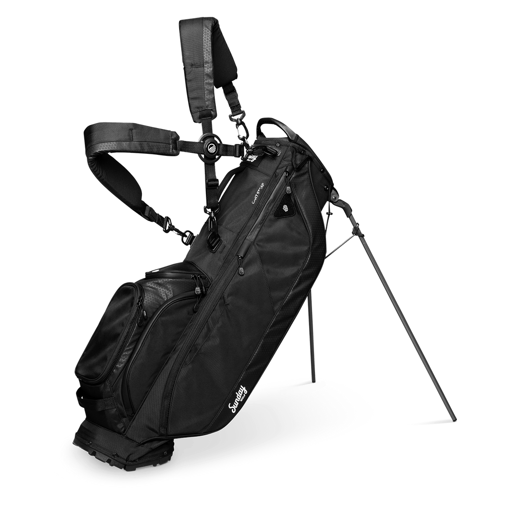 A full front shot of standing Ryder golf bag in matte black with double strap