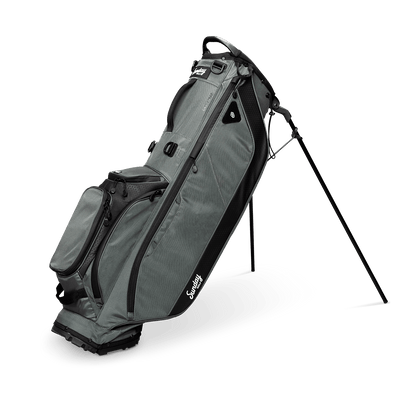 A full shot of standing Ryder golf bag in midnight green facing forward