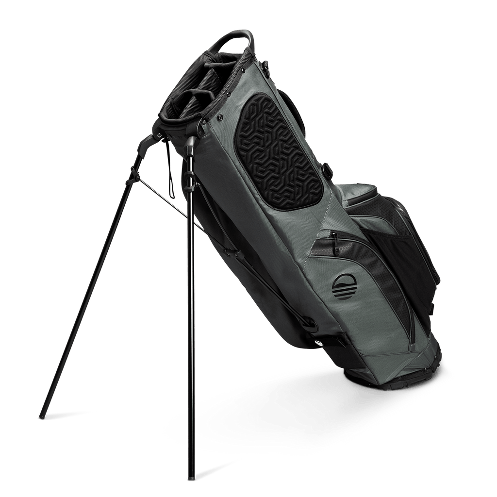 A full shot of standing Ryder golf bag in midnight green facing backward