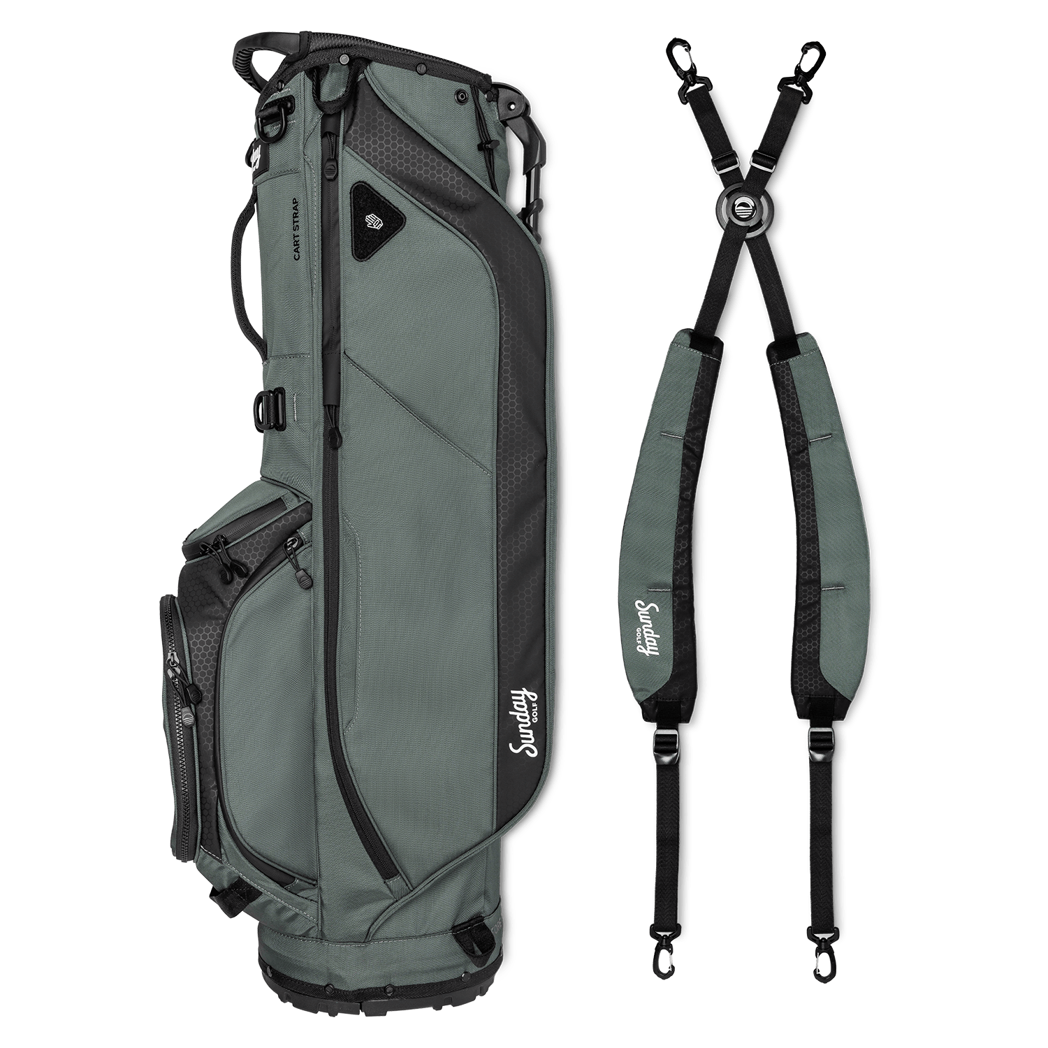 A full shot of Ryder golf bag in midnight green laying flat sideways beside its double strap