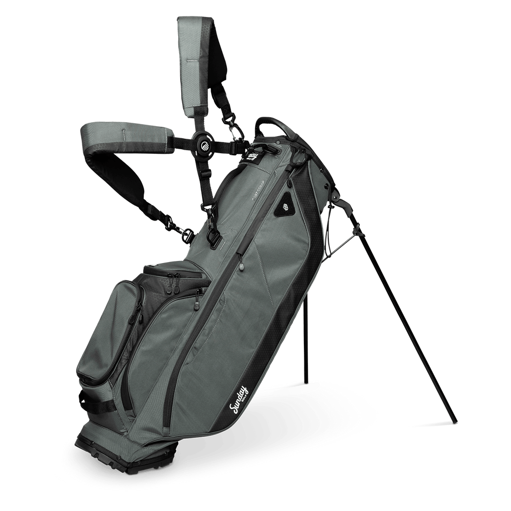 A full front shot of standing Ryder golf bag in midnight green with double strap