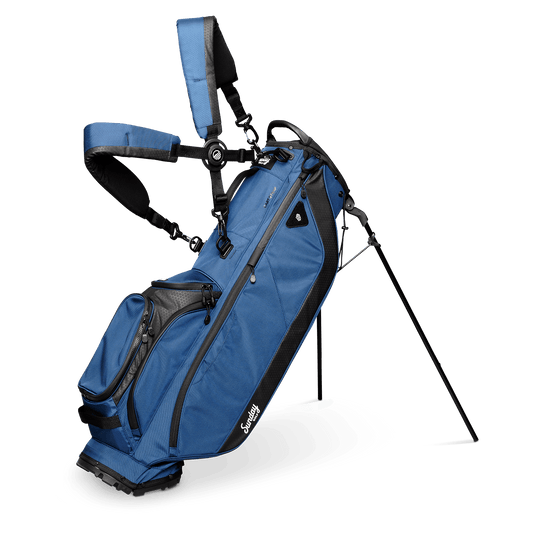 A full front shot of standing Ryder golf bag in navy blue with double strap