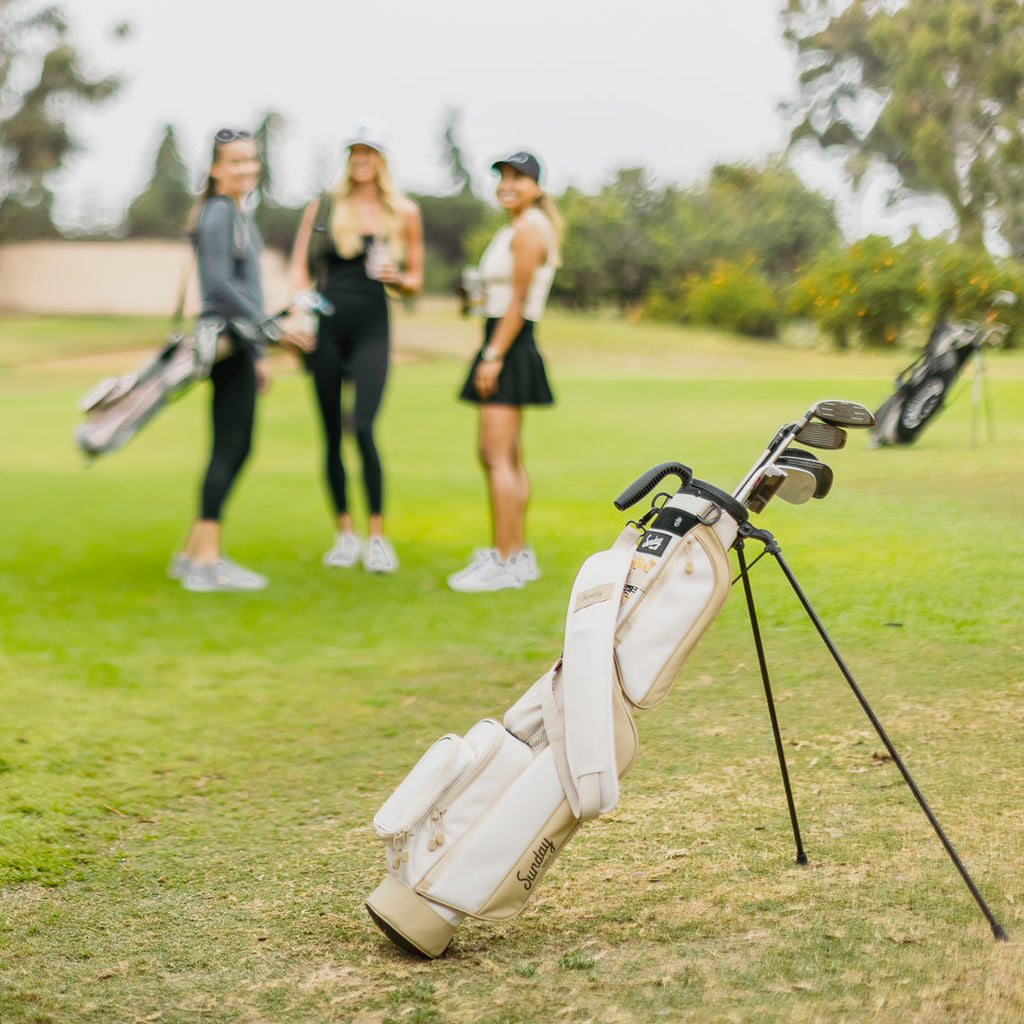 toasted almond loma bag on golf course 