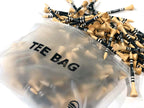 bamboo golf tees spilling from a ziplock tee bag