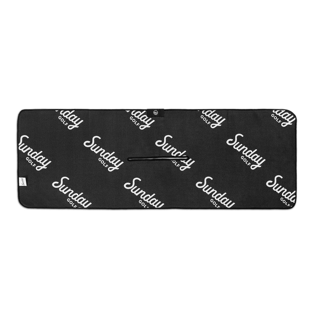 back of greatest swing towel with white Sunday Golf logo on a black background
