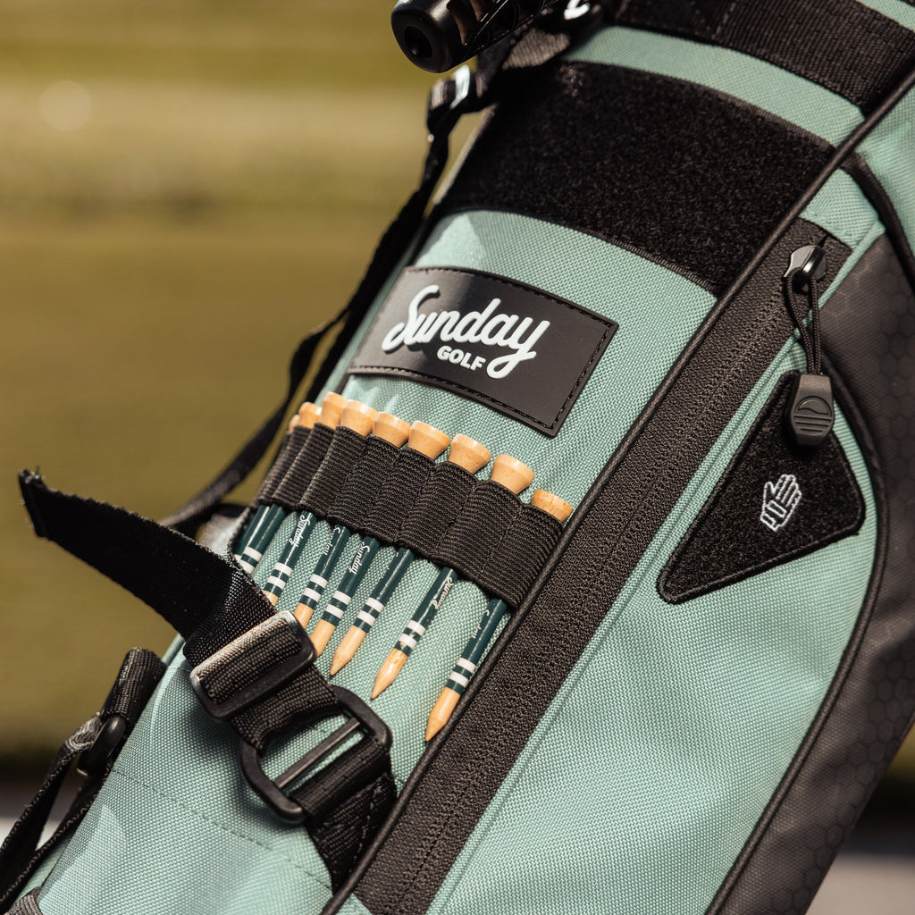 bamboo golf tees on seafoam Sunday golf bag
